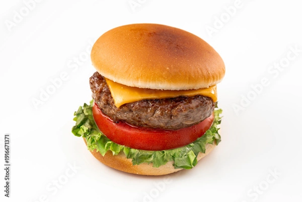 Obraz 白背景に置かれたチーズバーガー