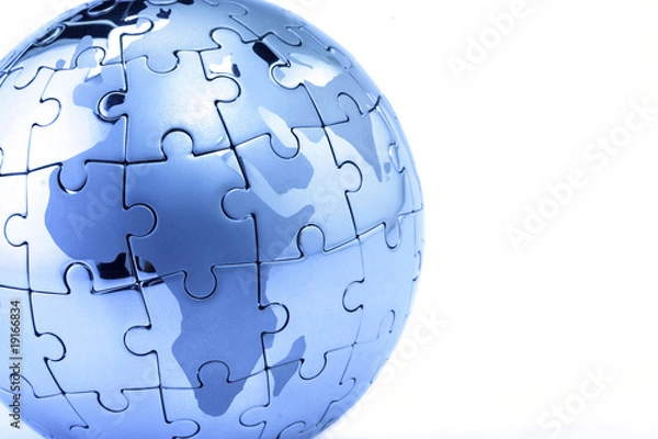 Fototapeta Globe puzzle showing the world