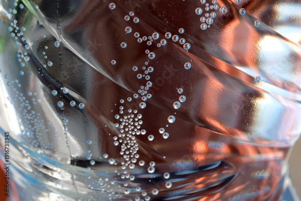 Obraz Bubbles dance in a refreshing drink captured in sunlight