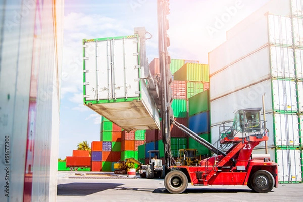 Fototapeta The forklift lifting container of transportation