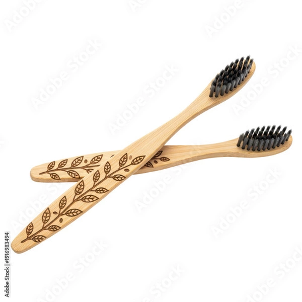 Fototapeta Two bamboo toothbrushes with engraved leaf pattern on transparent