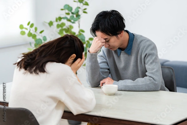 Obraz 頭を抱える男女