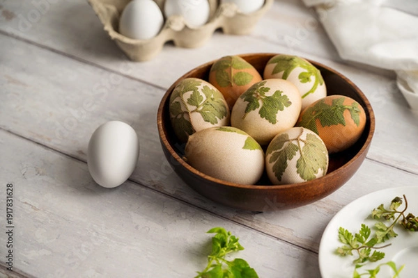 Obraz DIY Easter eggs with natural leaves, creating patterns on eggs using plants. Eco friendly colouring easter eggs