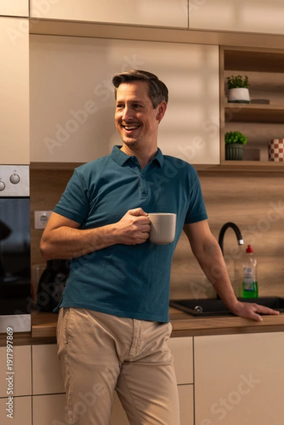 Obraz Man Drinking Coffee In The Kitchen