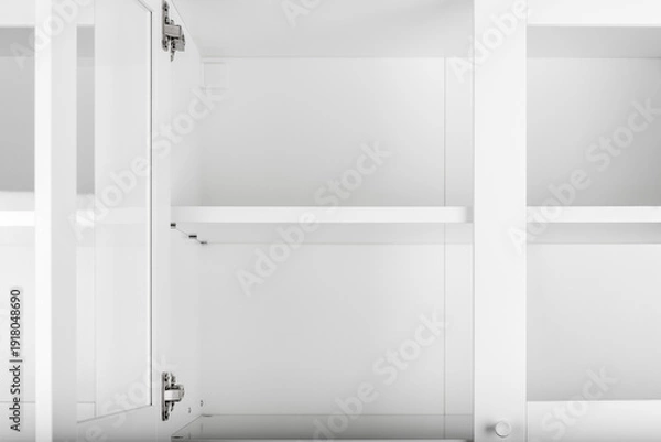 Obraz White cupboard with open door