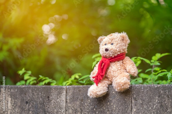 Obraz Classic teddy bear with red bow.