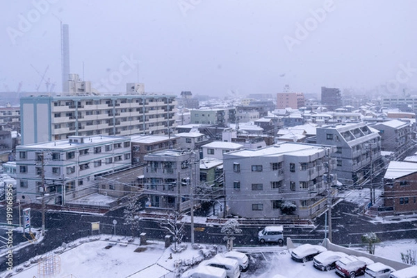 Obraz 雪が降り積もる街並みの風景