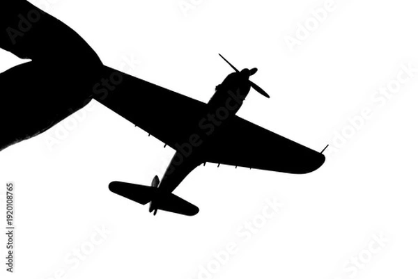 Obraz 指でつままれたシルエットのプロペラ戦闘機