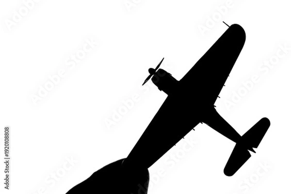 Obraz 指でつままれたシルエットのプロペラ戦闘機