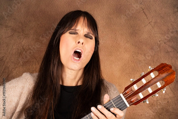 Obraz Singende Frau mit Gitarre