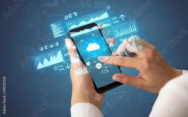 Fototapeta Hand using phone with financial tracking concept