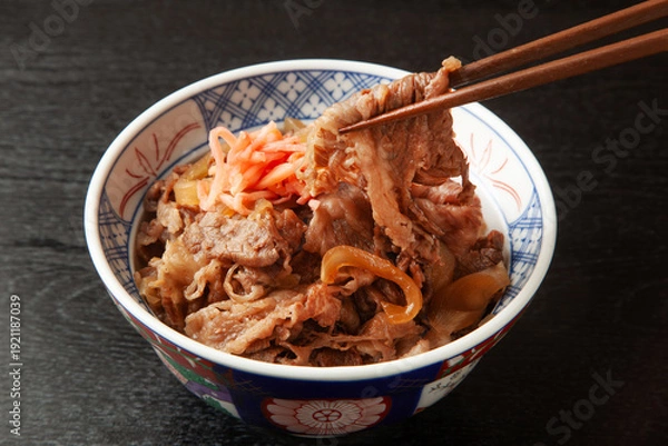 Obraz 箸で持ち上げた牛丼