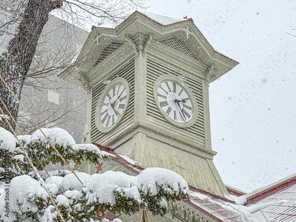 Obraz 雪の日の札幌時計台。日本北海道札幌市にある有名な観光スポット。