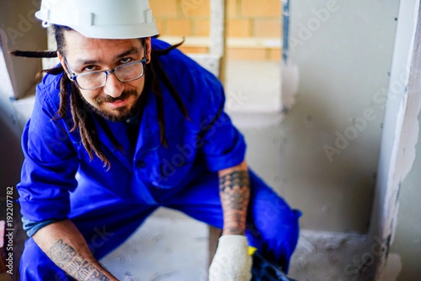 Fototapeta Worker on a consruction site