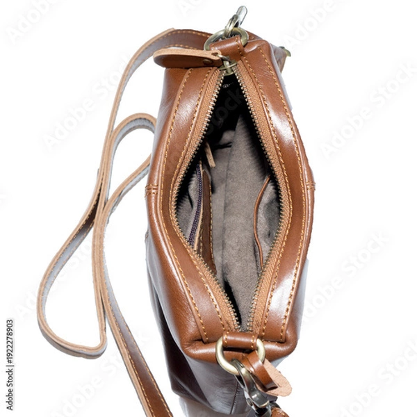 Obraz Open and empty leather bag isolated on white background