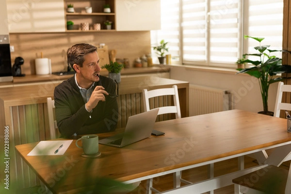 Obraz Man Thinking While Working At Home