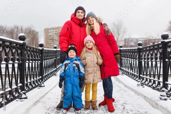 Obraz Image of family with children in winter on walk