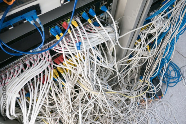 Obraz The tangled cable in rack cabinet