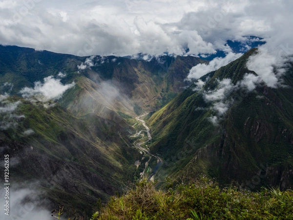 Fototapeta Panoramic view fron the top of Machu Picchu mountain, the river and the Hidroelectrica