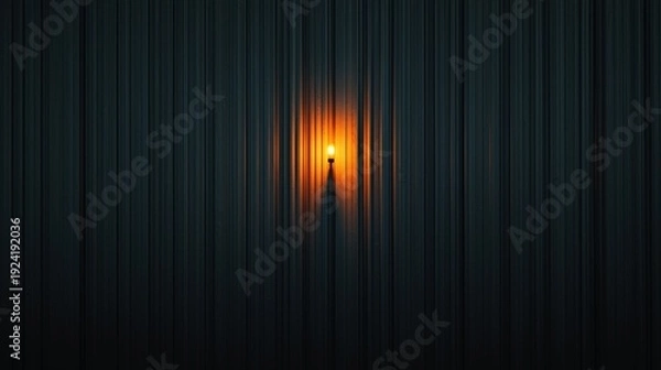 Obraz A single light source in a dark room.