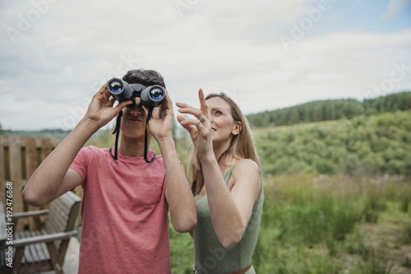 Fototapeta Looking Through Binoculars
