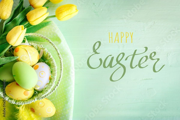 Fototapeta Happy Easter. Congratulatory easter background. Easter eggs and flowers.