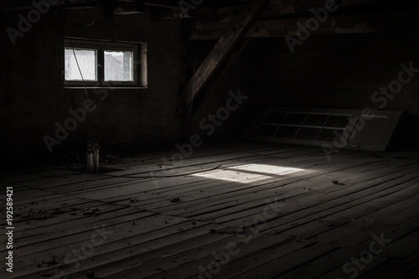Fototapeta Light through the window in the attic