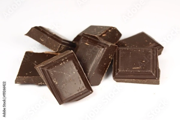 Fototapeta Bars of chocolate on white background