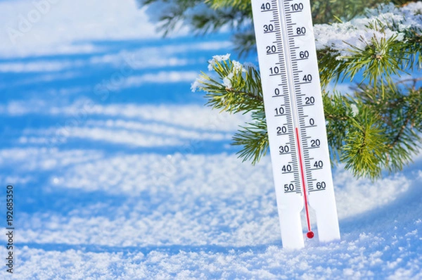 Obraz Wintertime. Winter background with  thermometer in the snow on frosty day.