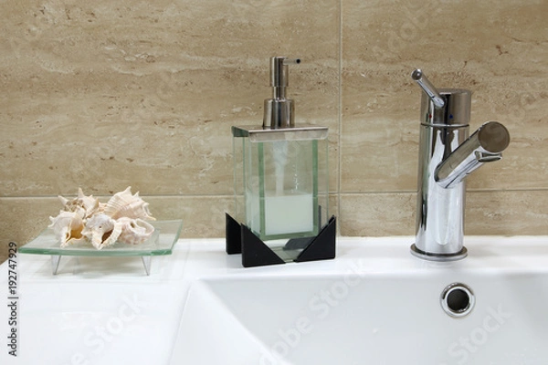 Fototapeta clean and modern sink with toiletries