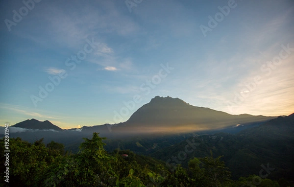 Obraz beautiful view of sunrise with mountain and ray of light 