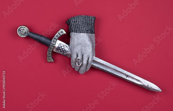 Obraz Templar sword isolated on red background