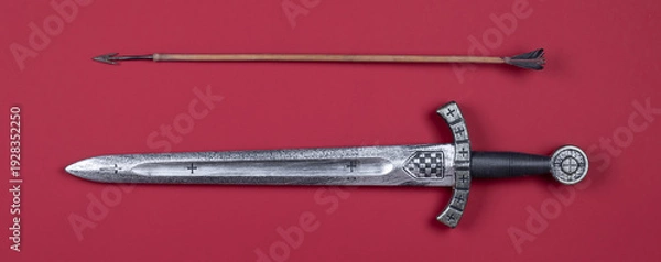 Obraz Templar sword isolated on red background
