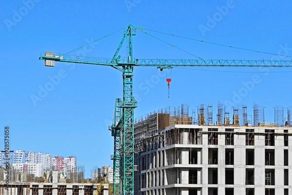 Obraz Crane and high-rise construction