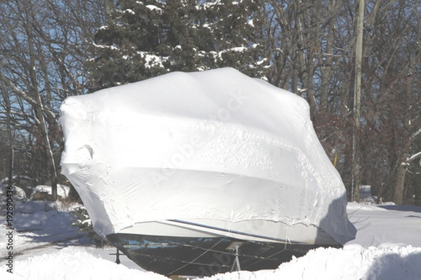 Obraz Plastic shrink wrap on boat, to protect boat and interior of boat from the winter elements.   

