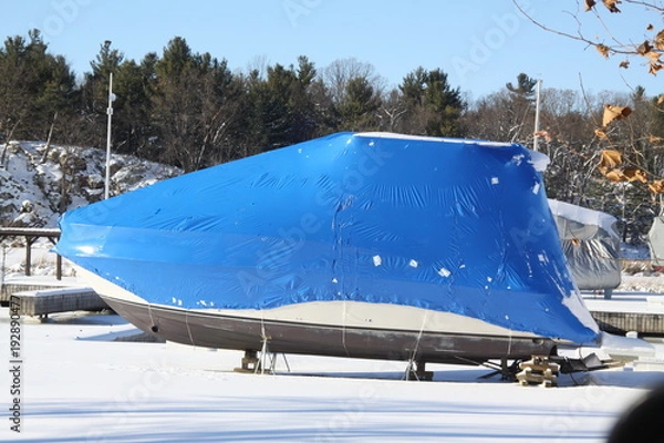 Obraz Plastic shrink wrap on boat, to protect boat and interior of boat from the winter elements.   

