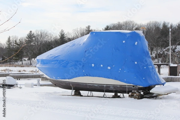 Obraz Plastic shrink wrap on boat, to protect boat and interior of boat from the winter elements.   

