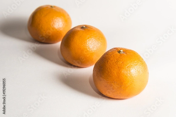 Obraz Mandarins on a light background