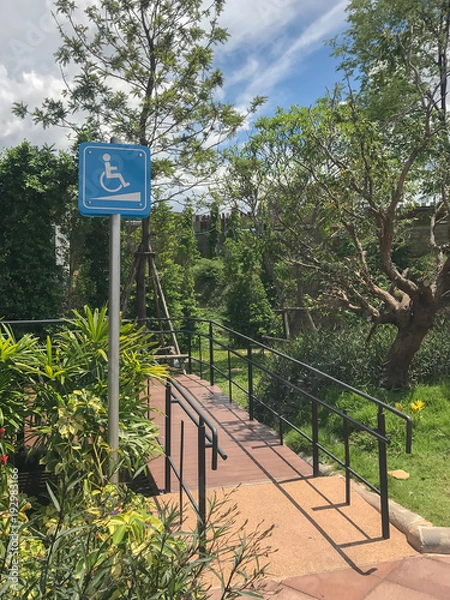 Fototapeta ramp for wheelchair and tower sign board