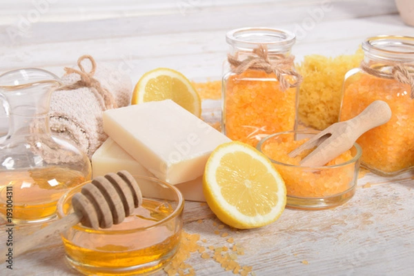 Obraz Refreshing lemon salt to the feet and bath with olive oil to the body with natural soap and a sponge