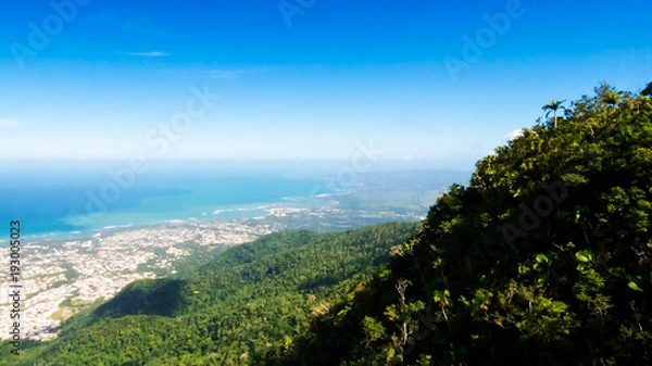 Obraz An amazing view of Puerto Plata, the Atlantic Ocean and a lot of tropical trees from the top of Mount Isabel de Torres, Dominican Republic.
