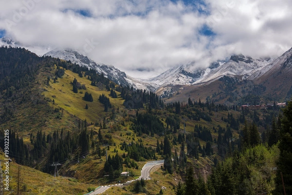 Obraz Picturesque car road and mountains covered with snow, Chimbulak, Almaty, Kazakhstan