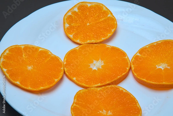 Obraz 皮が薄くてむきやすく、果汁たっぷりで本当においしい愛媛県産の柑橘類・甘平の輪切り