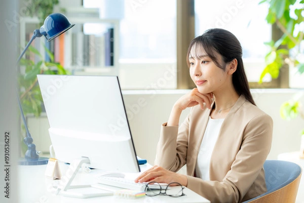 Obraz オフィスで働くビジネスウーマン