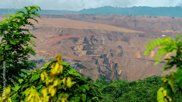 Fototapeta landscape that caused by open pit coal mining activity, Sangatta, Indonesia.  This mining activities will lead to environmental destruction