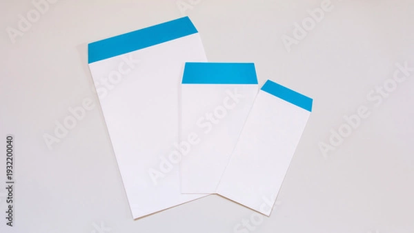 Obraz ブルーフラップデザインの企業向け封筒モックアップ