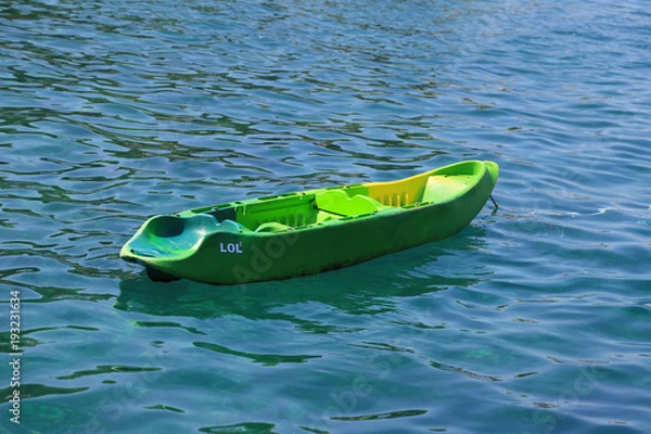 Fototapeta small plastic boat