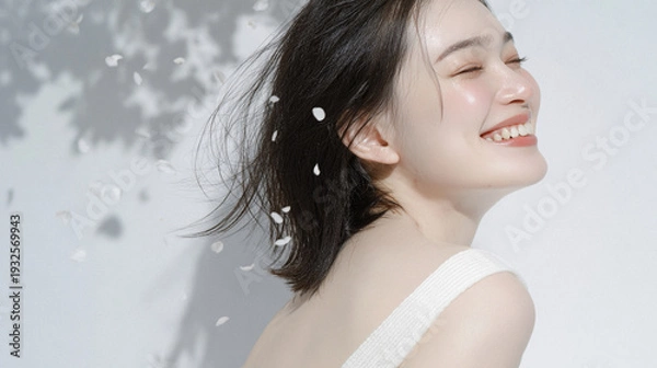 Obraz 美しい肌の女性と桜が舞う春の背景