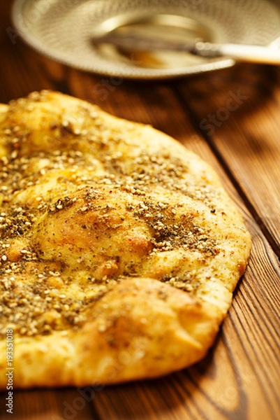 Obraz Zaatar spice mix with naan bread