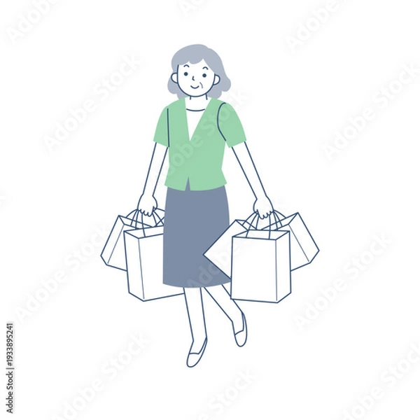 Obraz 多数のショッピングバッグを持って歩くシニア女性